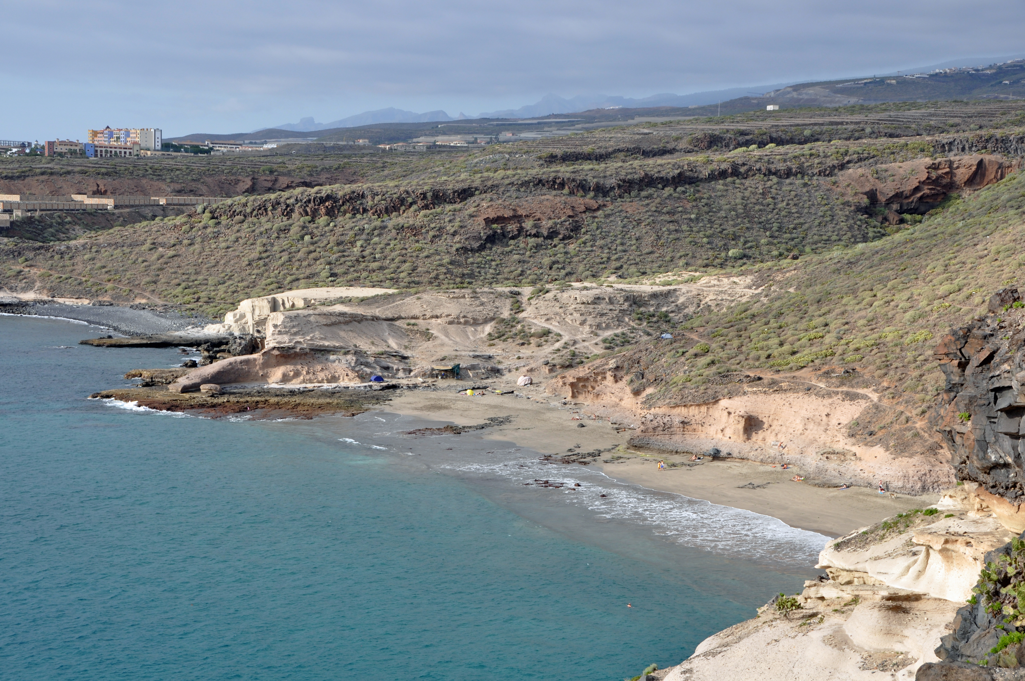 Diego Hernandez beach in Tenerife, featuring a sandy shoreline with calm water conditions