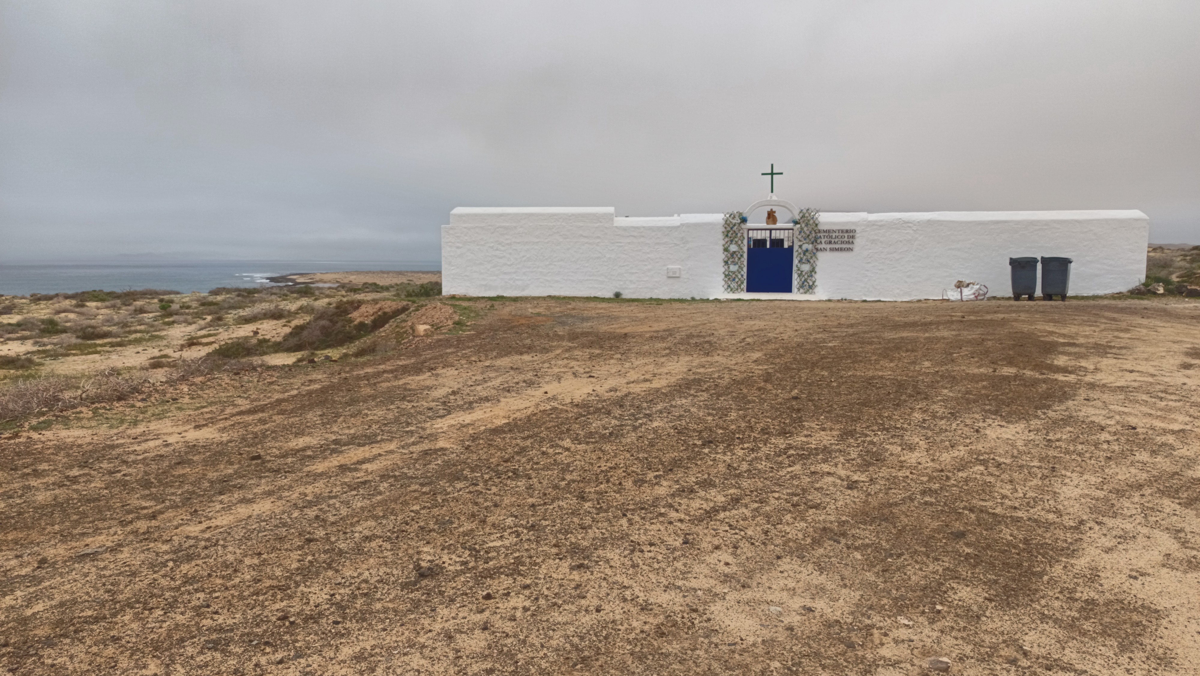 Playa del Salado beach in La Graciosa, featuring a sandy shoreline with wavy water conditions